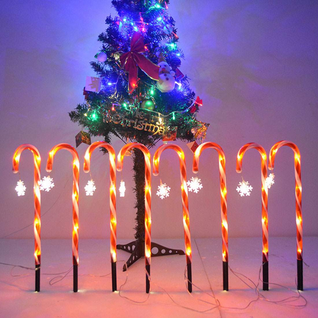 Brighten Your Store's Holiday Offerings with Candy Cane Pathway Stakes Lights